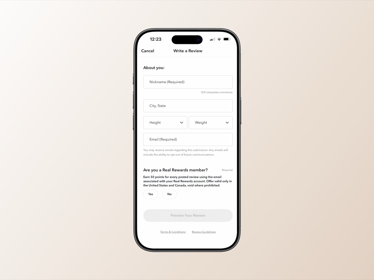 Write a Review screen showing Real Rewards loyalty prompt — earn 50 points per review